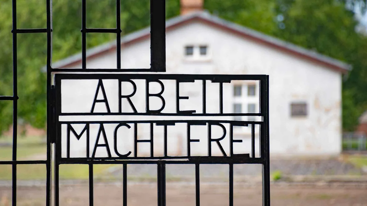 Entrance gate of the Sachsenhausen Memorial on a Sachsenhausen tour from Berlin